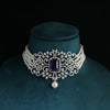 choker-style pearl and diamond necklace featuring a stunning deep blue gemstone centerpiece