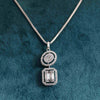 Baguette and Round Cluster Pendant surrounded by One Row Halo With Chain