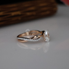 1 ct Oval Cut Lab Grown Diamond Engagement Ring with Twisted Pave Band in Rose Gold