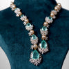 Pearl and Diamond Necklace with Emerald Accents