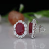 Oval Ruby Lab Grown Diamond Halo Stud Earrings in 14k White Gold