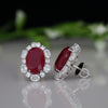 Oval Ruby Lab Grown Diamond Halo Stud Earrings in 14k White Gold