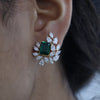 Fancy lab-grown diamonds embracing a zambian emerald-bold, graceful, and timeless