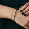 A sleek and sophisticated bangle adorned with sparkling lab-grown diamonds - perfect for elevating everyday elegance or special occasions